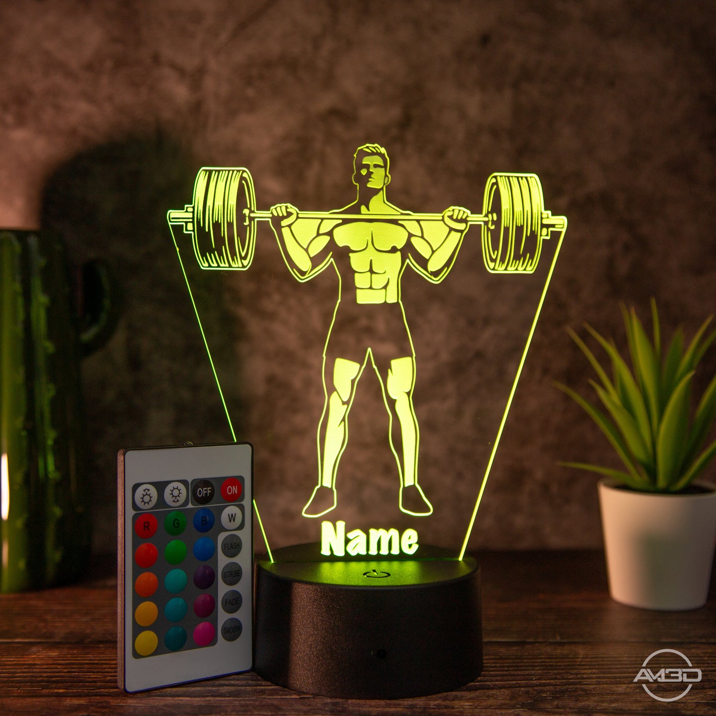 Personalisierbare LED Tischlampe aus Acryl "Gewichtheber" - AM3D Shopmit Kunststoffsockel