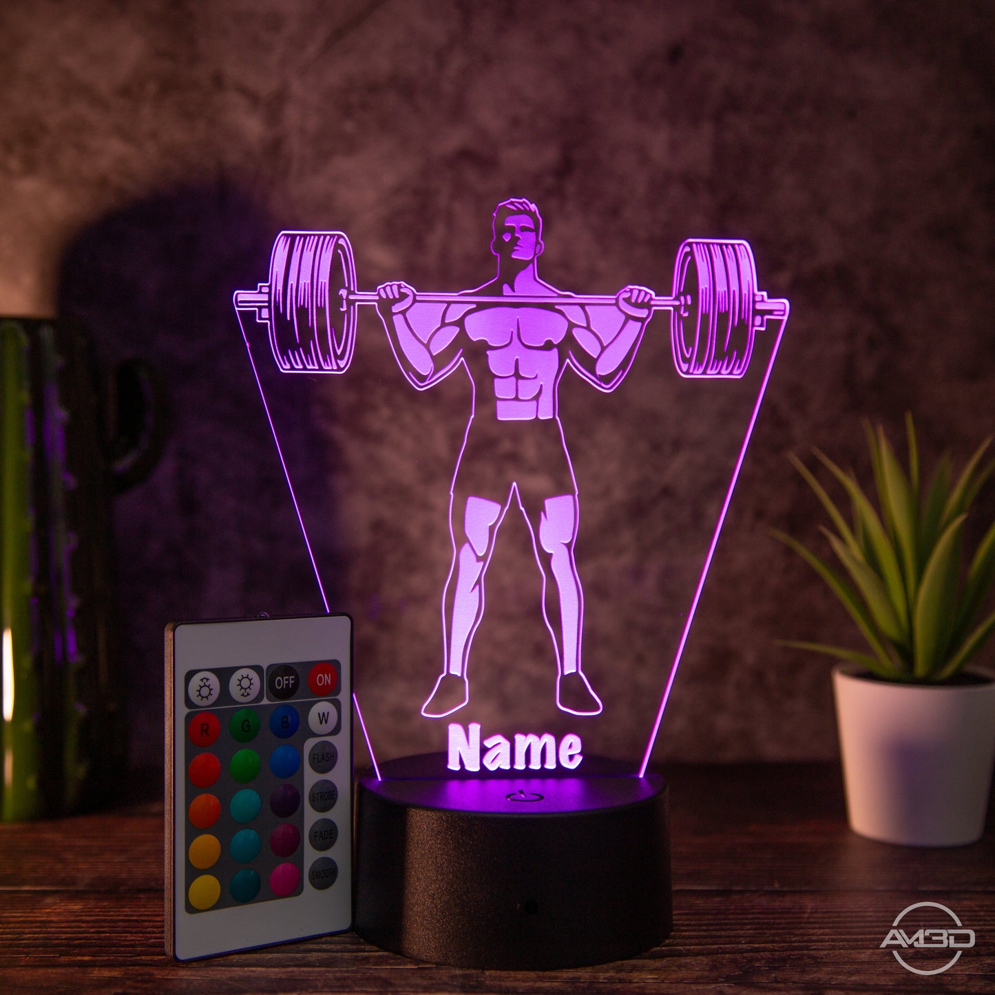 Personalisierbare LED Tischlampe aus Acryl "Gewichtheber" - AM3D Shopmit Kunststoffsockel