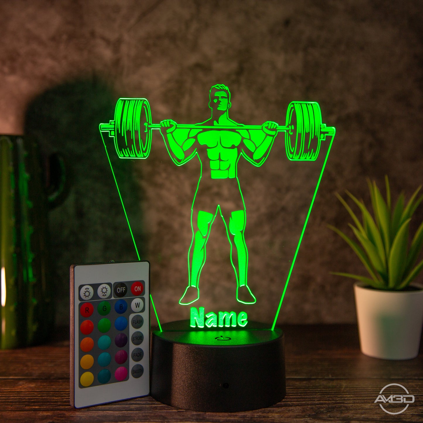 Personalisierbare LED Tischlampe aus Acryl "Gewichtheber" - AM3D Shopmit Kunststoffsockel