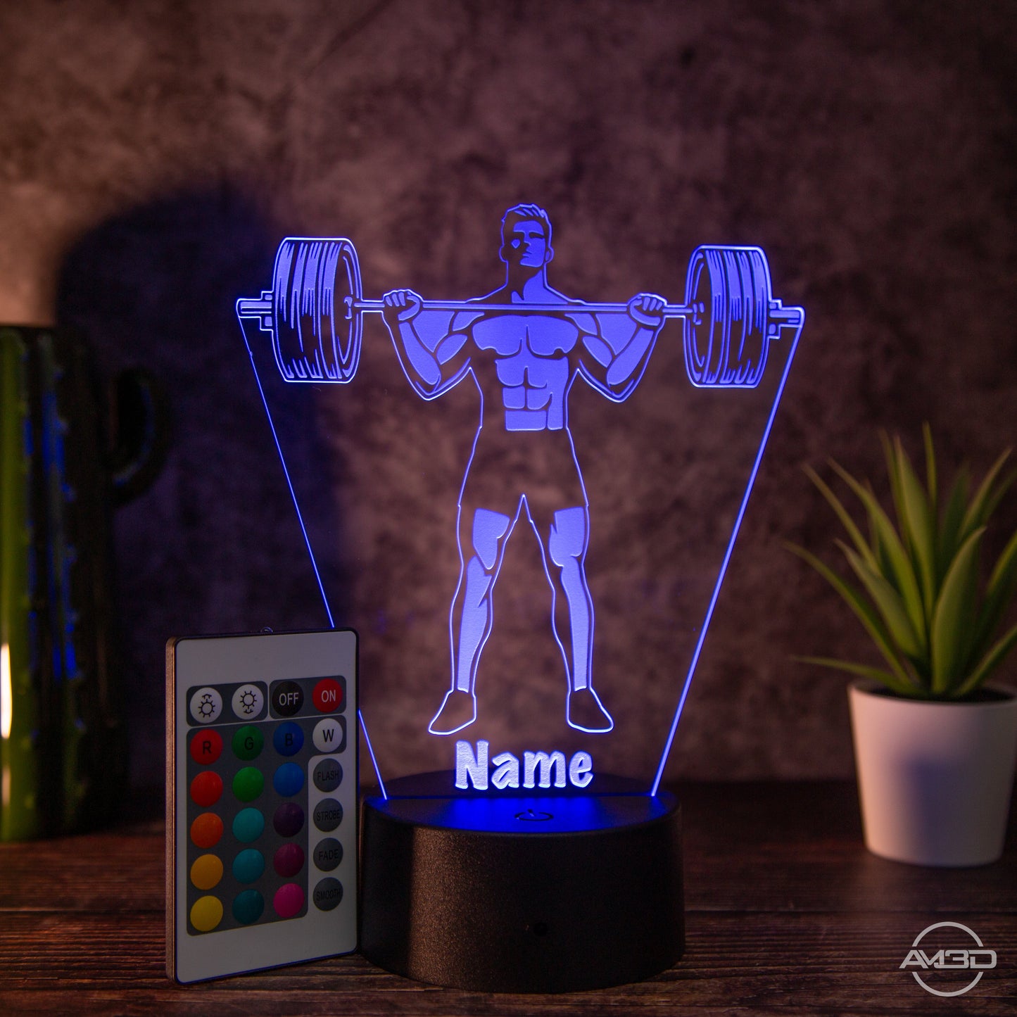 Personalisierbare LED Tischlampe aus Acryl "Gewichtheber" - AM3D Shopmit Kunststoffsockel