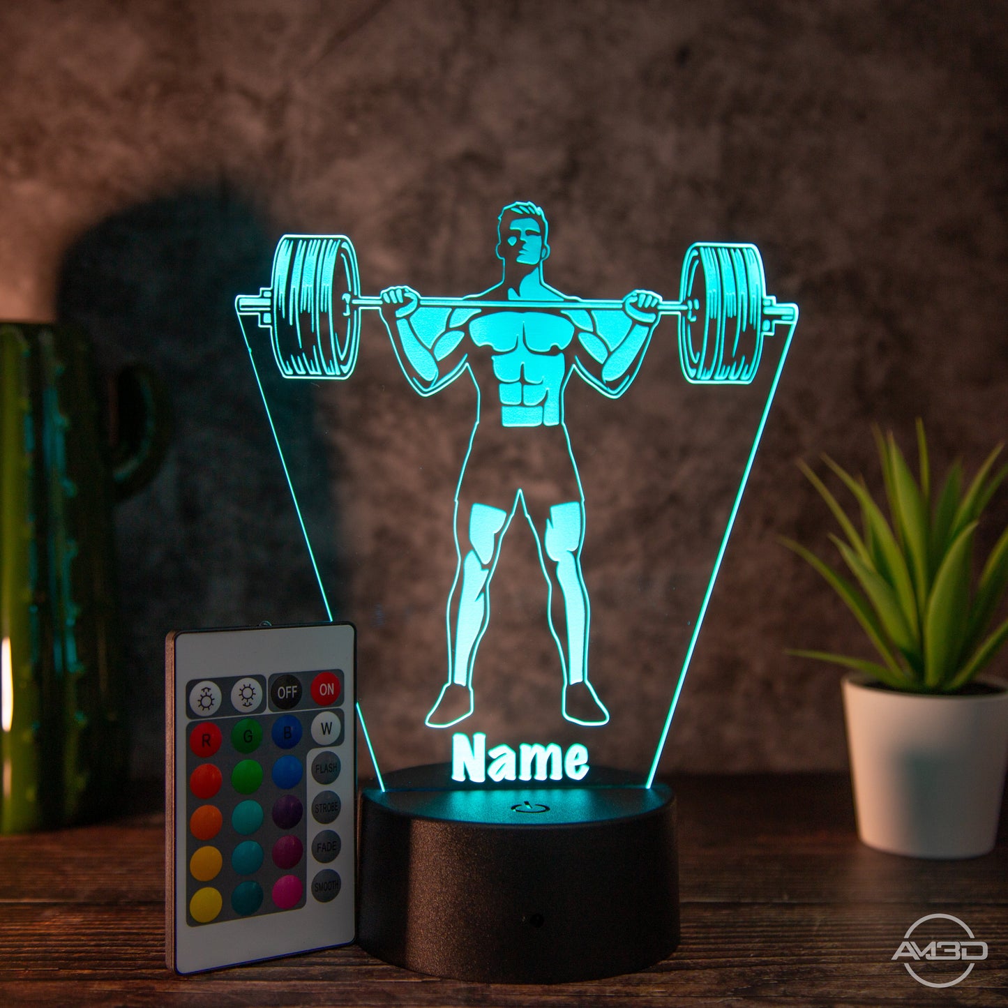 Personalisierbare LED Tischlampe aus Acryl "Gewichtheber" - AM3D Shopmit Kunststoffsockel