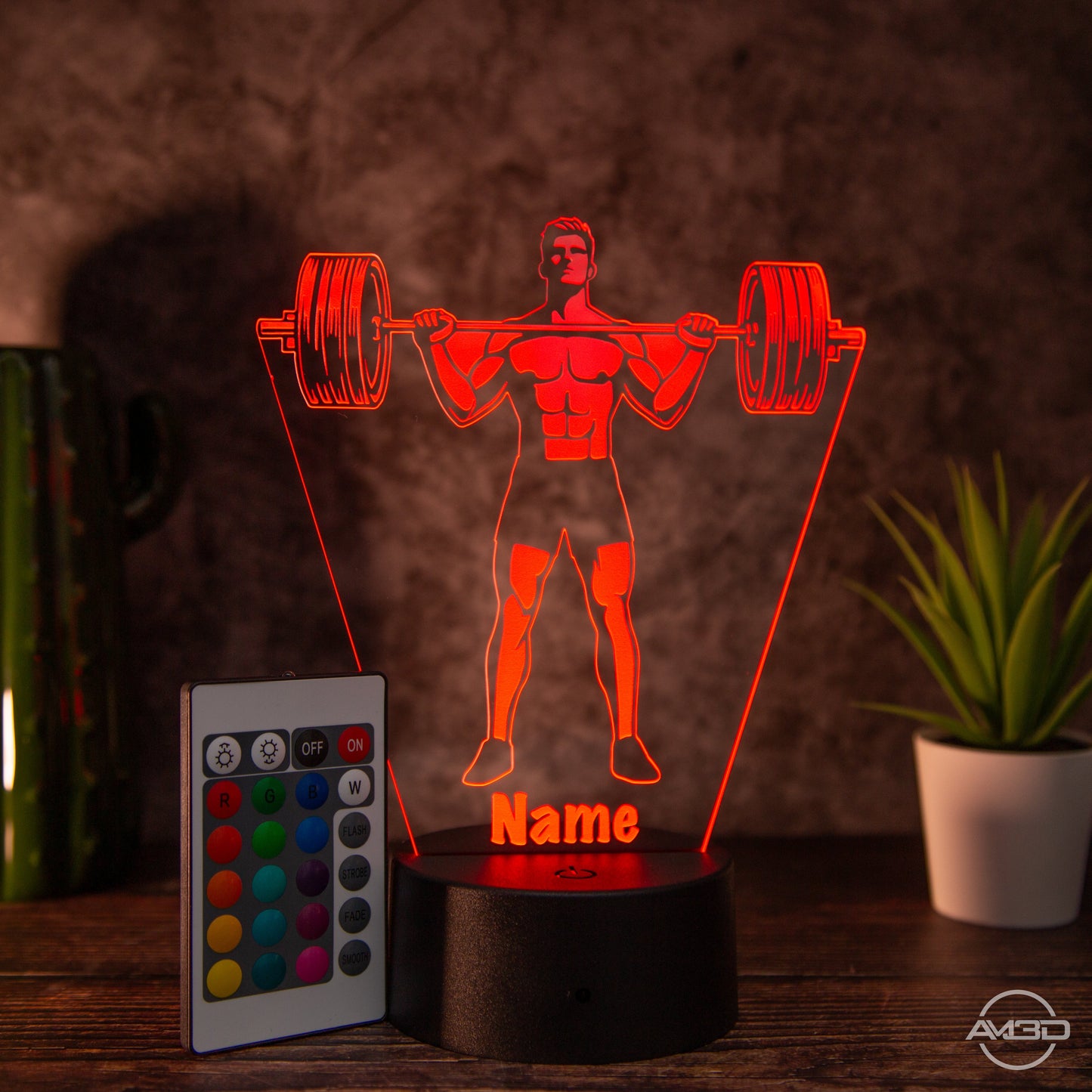 Personalisierbare LED Tischlampe aus Acryl "Gewichtheber" - AM3D Shopmit Kunststoffsockel